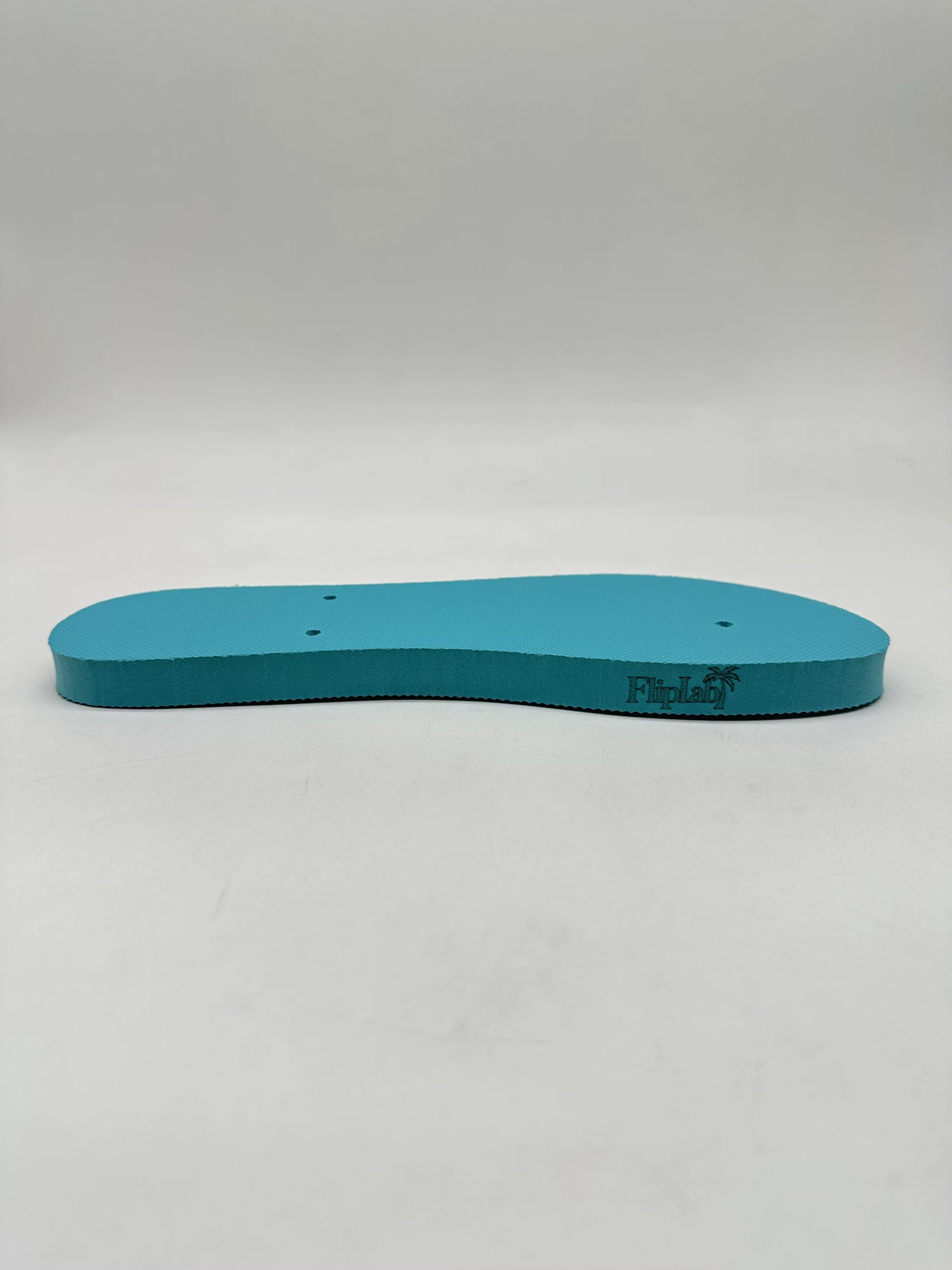 Actual FlipLab sole profile with its printed side logo